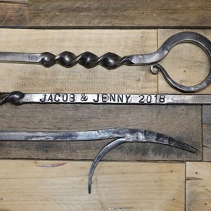 Personalized fire poker hand forged