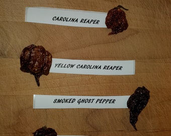 Organic Carolina Reaper, Yellow Reaper, Ghost pepper and habanero. Fiery hot! These dried peppers will knock your socks off.