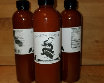 Blazing Dragon Ghost Pepper Sriracha made w/ 100% Organic Peppers. Made in the U.S.A.  Smoldering hot and delicious hot sauce! INFERNO!