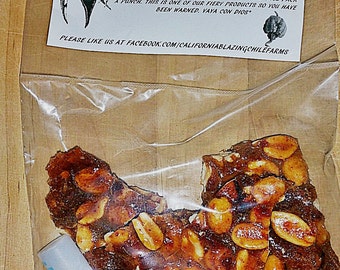 Carolina Reaper Peanut Brittle-World's Hottest Pepper makes a Devastating snack! Organically cultivated peppers forges hellhot goodies