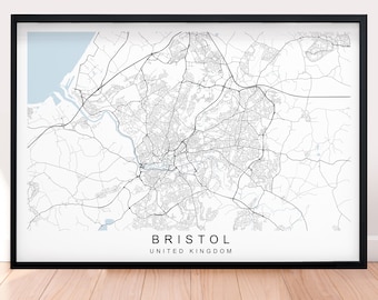 May include: A black and white map of Bristol, United Kingdom, with a light blue outline of the Bristol Channel. The map shows the city's streets and roads, as well as some of its landmarks.