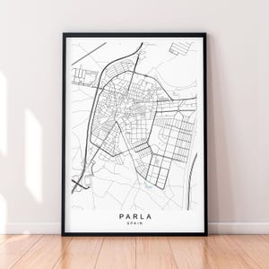 May include: A black and white line art map of Parla, Spain. The map shows the city's streets and roads.