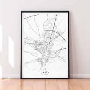 Könnte beinhalten: Ein Schwarz-Weiß-Linienkunst-Kartenabdruck von Jaén, Spanien. Die Karte zeigt die Straßen der Stadt und die Umgebung.