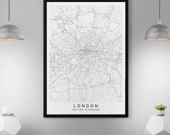 May include: A black and white map of London, United Kingdom, with a black frame. The map shows the city's streets and roads.