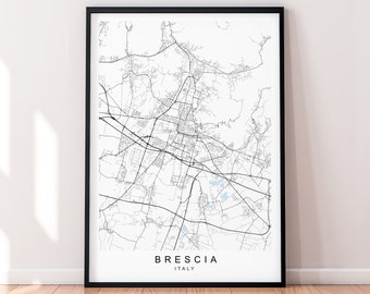 May include: A black and white map print of Brescia, Italy. The map shows the city's streets and waterways. The city name is printed in black at the bottom of the map.