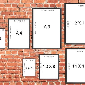 May include: A comparison of different sizes of picture frames, including A3, A4, A5, 12x16, 11x14, 10x8, and 7x5. The frames are black and have white mats. The frames are displayed on a brick wall.