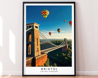 May include: A framed print featuring the Clifton Suspension Bridge in Bristol, United Kingdom. Colorful hot air balloons float in the blue sky above the bridge. The print includes the text "BRISTOL UNITED KINGDOM" at the bottom.