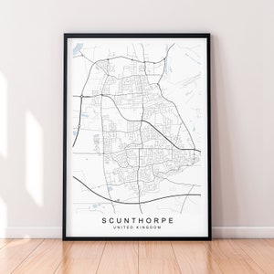 May include: A black and white map print of Scunthorpe, United Kingdom. The map shows the city's streets and roads.