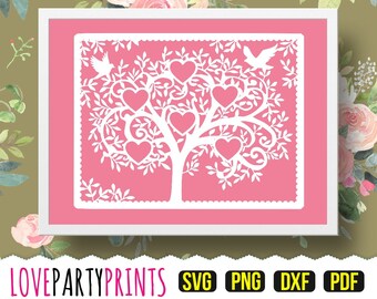 May include: A white silhouette of a tree with hearts and birds on a pink background. The tree has a whimsical, intricate design with swirling branches and leaves. The hearts are arranged throughout the branches, and the birds are perched on the top branches. The image is framed with a white border.