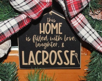 This home is filled with love laughter & LACROSSE  -  Sign