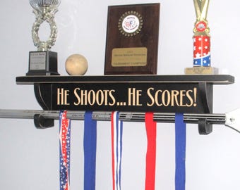 He Shoots... He Scores!  - Trophy Shelf