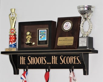 HE SHOOTS... HE SCORES!  - Trophy Shelf