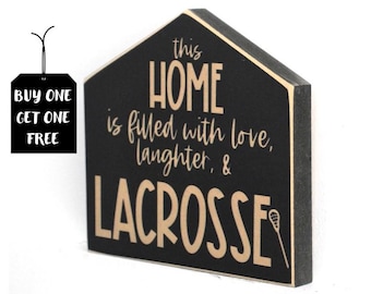 This home is filled with love laughter & LACROSSE  -  Sign