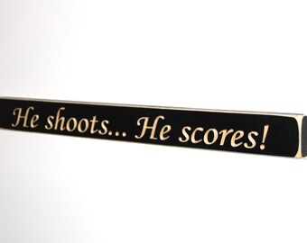 He shoots... He scores! - Sign