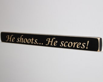 He shoots... He scores! - Sign