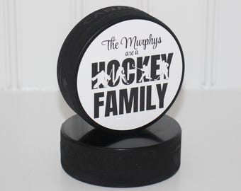 "NAME" are a Hockey Family - Puck Sign