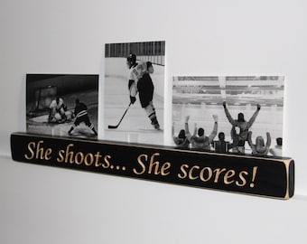 She shoots... She scores!  -  Photo Sign