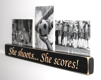 She shoots... She scores!  -  Triple Photo Sign