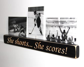 She shoots... She scores!  -  Photo Sign