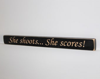 She shoots... She Scores!  -  Sign