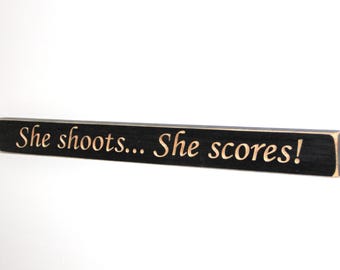 She shoots... She Scores!  -  Sign