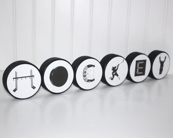 "HOCKEY" Pucks Sign