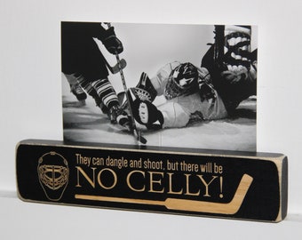 You can dangle and shoot, but there will be no celly!  -  Photo Sign