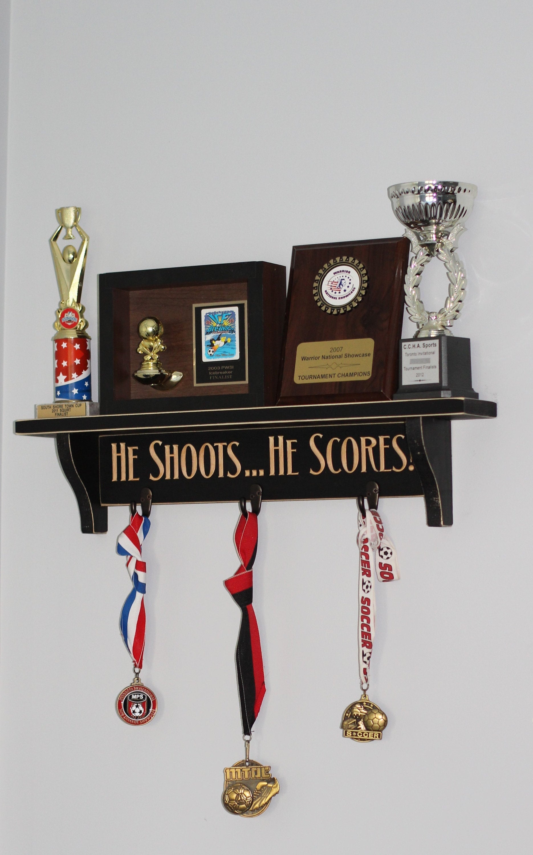 HE SHOOTS... HE SCORES! Trophy Shelf