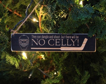 They can dangle and shoot, but there will be NO CELLY! - Ornament
