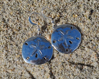 Sterling Silver Sand Dollar Earrings.  These beautiful earrings measure approximately 12 mm in diameter.