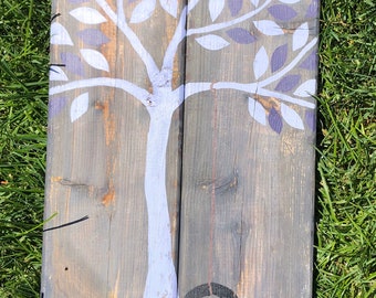 Tree with Tire Swing art on weathered wood