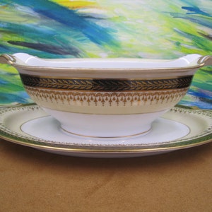 Vintage Noritake occupied Japan gravy boat with attached underplate