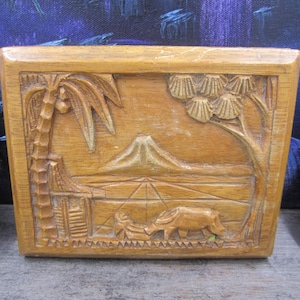Carved wooden box with Asian decor