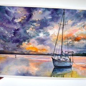 May include: Watercolor painting of a sailboat on a calm body of water at sunset. The sky is a mix of purple, orange, and yellow with fluffy clouds. The water reflects the colors of the sky.
