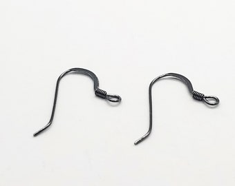 May include: Two black metal earring hooks with a small loop at the end.