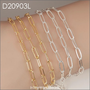 May include: Gold and silver chain bracelets with oval links are displayed. The bracelets are shown on a wrist. The image includes the text "D20903L" and "InTheWorksBeads".