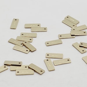 14Kゴールドフィルドタグ | 長方形 | 3 mm x 8 mm、25ゲージ | リング付きまたはリングなし | 6個入り | 30個、90個でまとめ買い割引 | 米国製