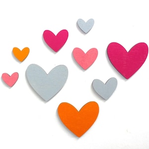 Wooden hearts in desired colors, hearts made of wood, motif set hearts