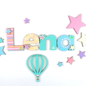 Letrero de puerta con el nombre de la habitación de los niños.