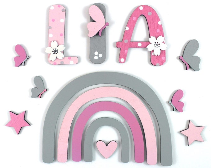 door sign wooden letters rainbow