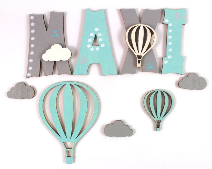 Wooden letters hot air balloon and clouds