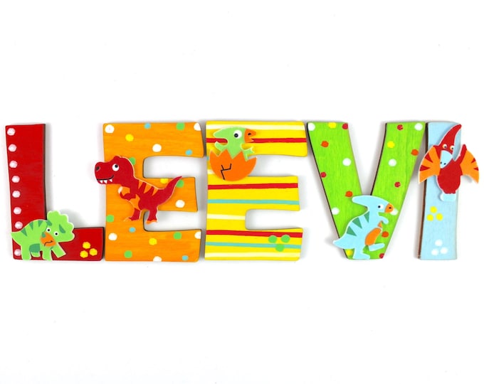 wooden letters with dinosaurs