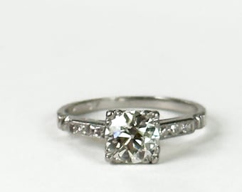 Art Deco Round Diamond and Platinum Engagement Ring With Square Setting