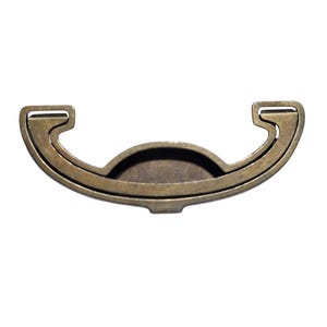 May include: A brass cabinet pull with a curved, open design. The pull has a smooth, polished finish.