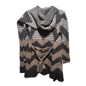 May include: A long-sleeved, black, white, and brown patterned cardigan with a large hood and a tie belt. The cardigan has a chevron pattern.
