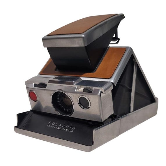 POLAROID SX-70 Land Camera Chrome Brown Leather Case Strap Papers