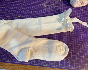 Ladies'  cream Regency/ Georgian/ Colonial knitted stockings with ribbon garter