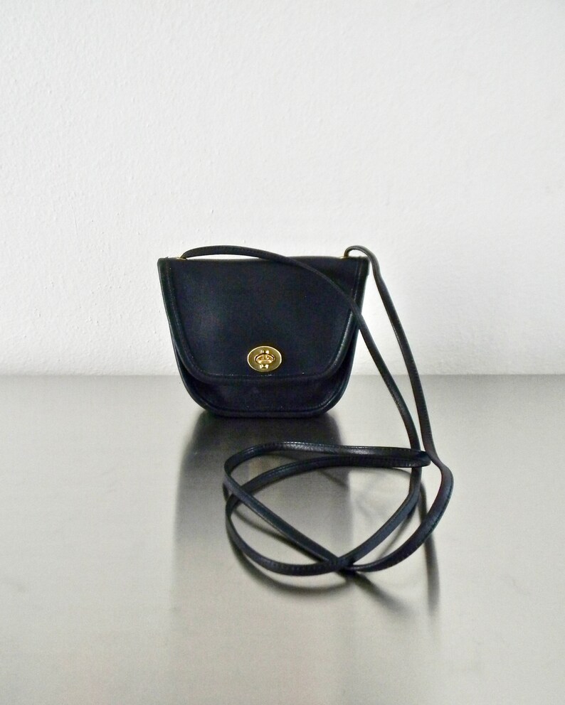 small navy blue coach purse