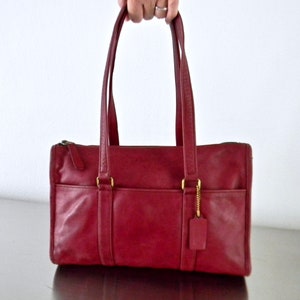 coach wine colored bag