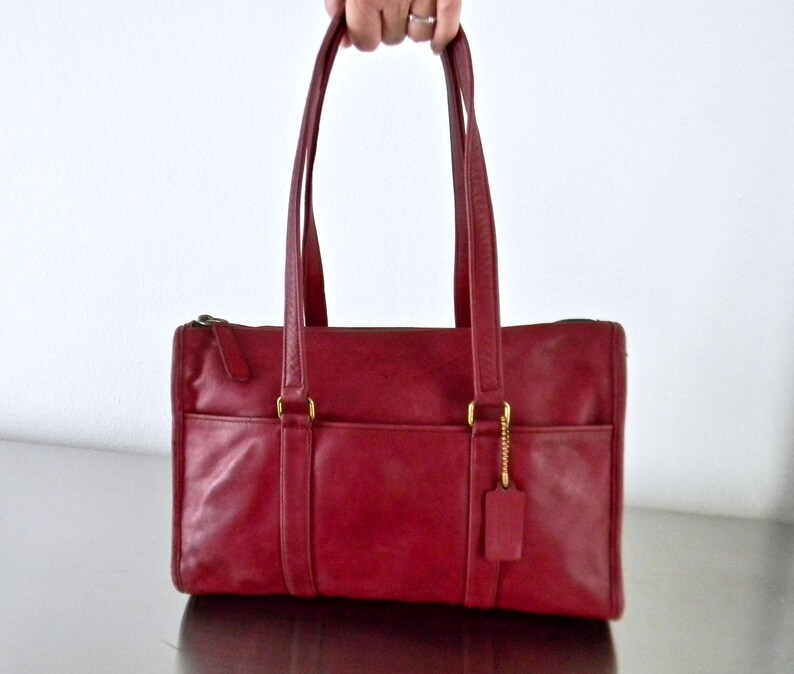 coach wine colored bag